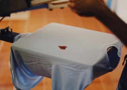 Heat press on white shirt with white heart design – tshirt printing