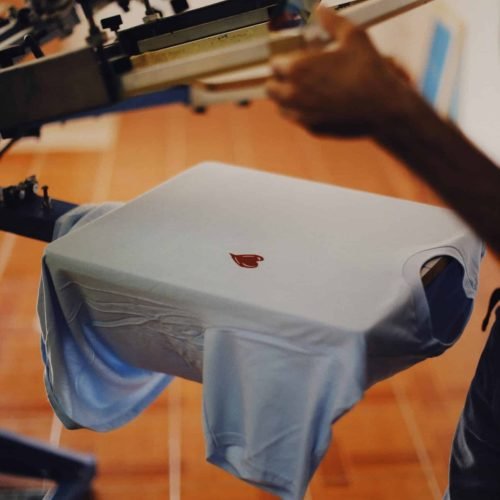 pexels-theplanetspeaks-9314012 Heat press on white shirt with white heart design – tshirt printing